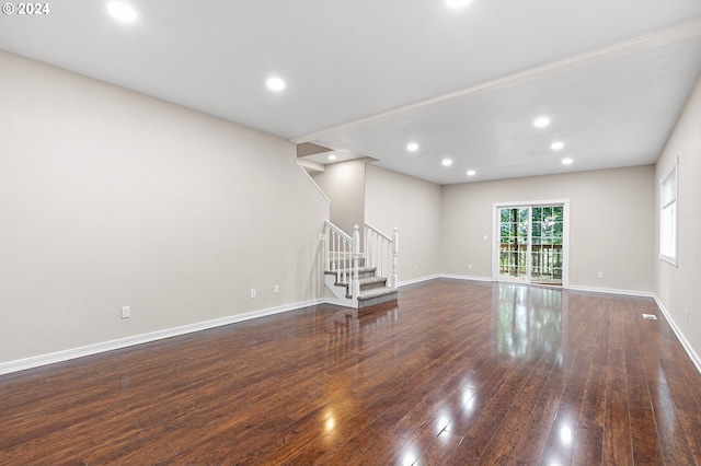 empty room with dark hardwood / wood-style floors