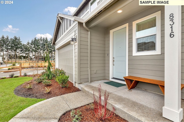 property entrance featuring a garage