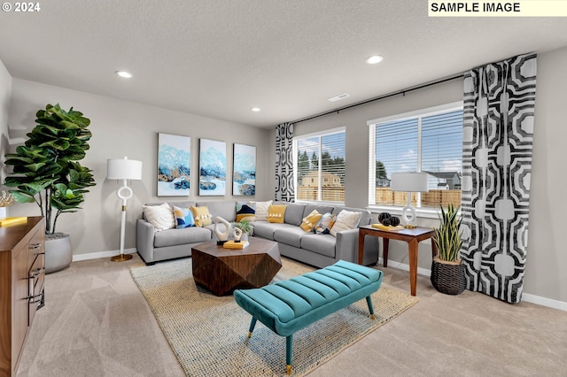 carpeted living room with a textured ceiling