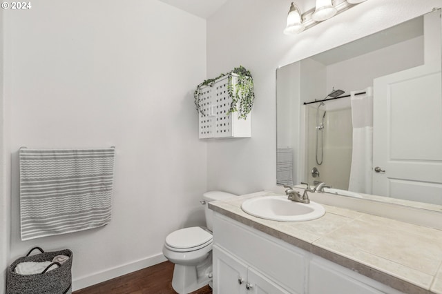 full bathroom featuring shower / bathtub combination with curtain, vanity, toilet, and wood-type flooring