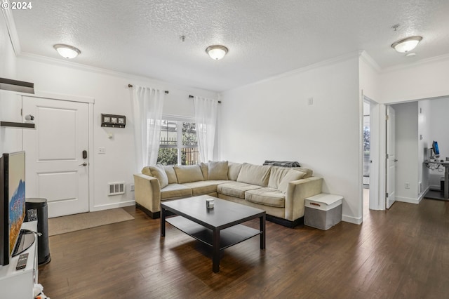 living room featuring a textured ceiling, dark hardwood / wood-style flooring, and crown molding