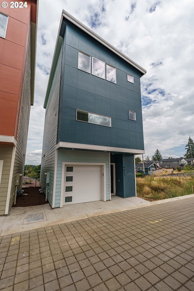 view of front of home with a garage