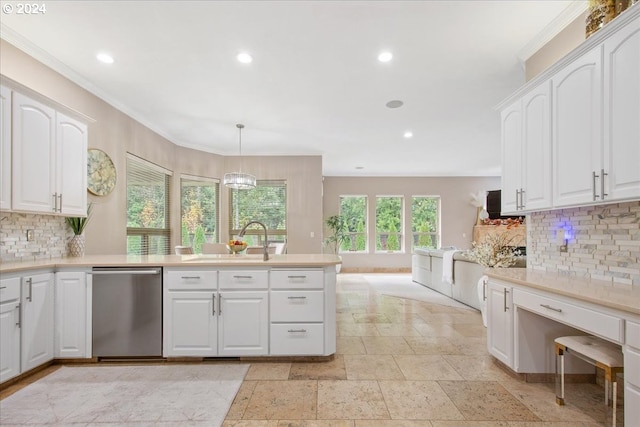 kitchen with pendant lighting, white cabinetry, a wealth of natural light, and stainless steel dishwasher