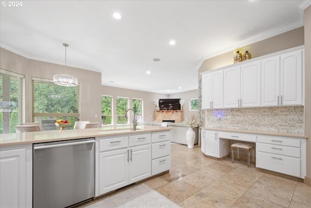 kitchen with decorative backsplash, pendant lighting, white cabinetry, and stainless steel dishwasher