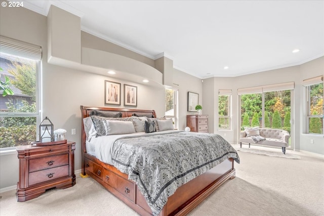 bedroom featuring light colored carpet and ornamental molding