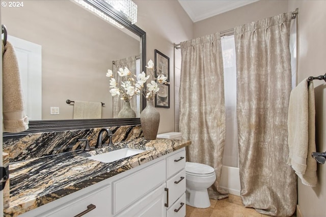 full bathroom featuring tile patterned floors, ornamental molding, vanity, shower / tub combo with curtain, and toilet