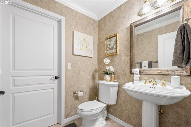 bathroom with toilet and ornamental molding