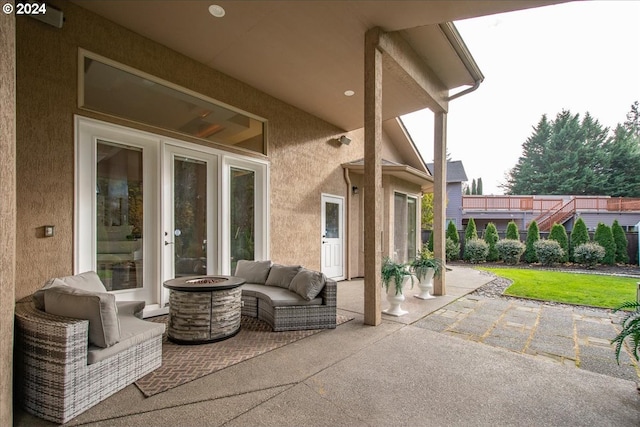 view of patio / terrace with a fire pit