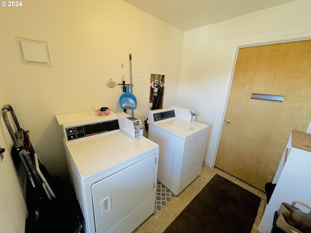 542 Pacific Ave, Brookings, OR 97415 - shared laundry featuring separate washer and dryer and light tile patterned floors