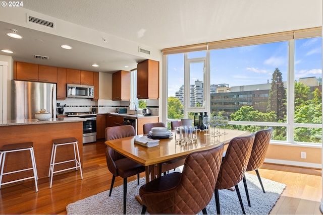 dining room featuring hardwood / wood-style floors