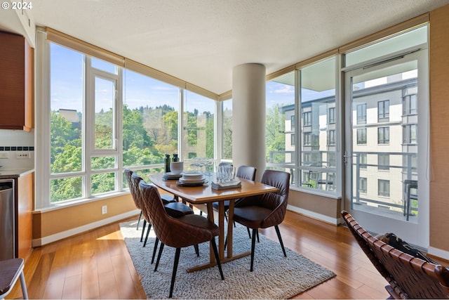 sunroom featuring a healthy amount of sunlight