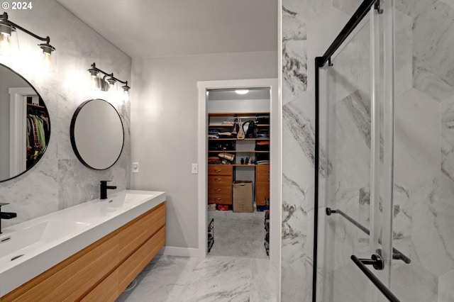 bathroom featuring vanity and walk in shower