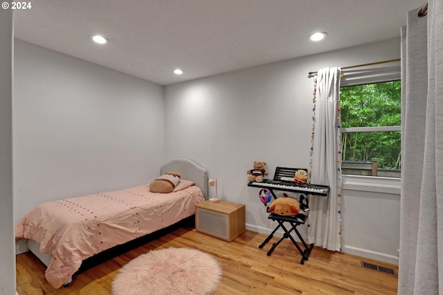 bedroom featuring light hardwood / wood-style flooring