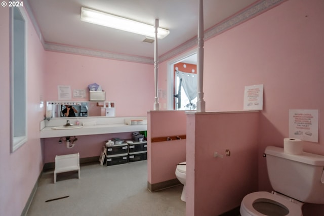 bathroom featuring toilet