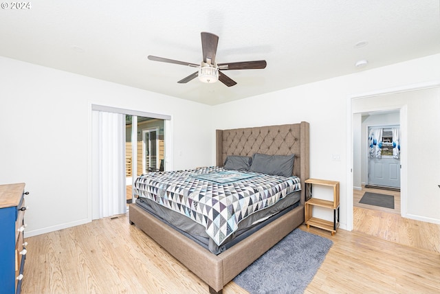 bedroom featuring a ceiling fan, access to outside, baseboards, and light wood finished floors