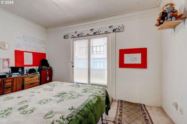 bedroom featuring a textured ceiling and ornamental molding
