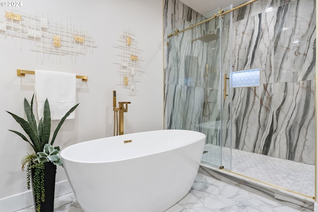 bathroom featuring separate shower and tub