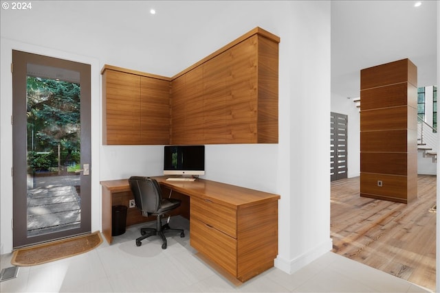 office area with light tile floors