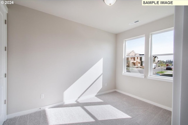 empty room with light carpet