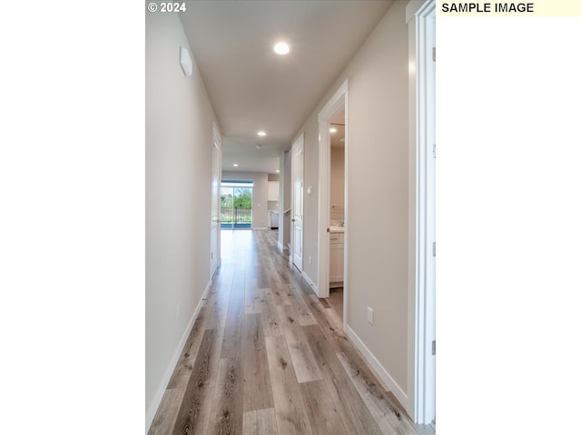 corridor featuring light wood-type flooring