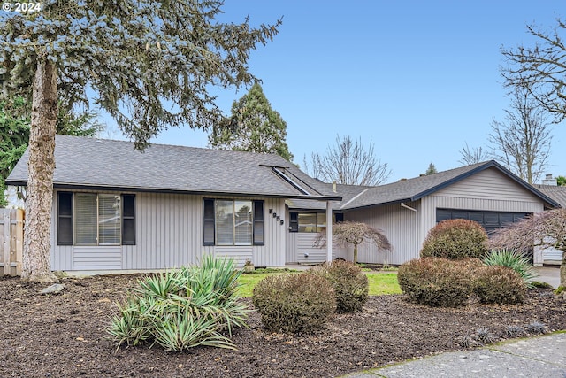 ranch-style house with a garage