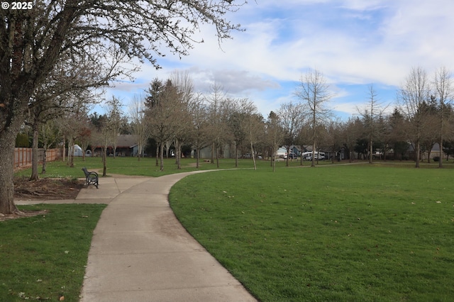 view of community featuring a yard