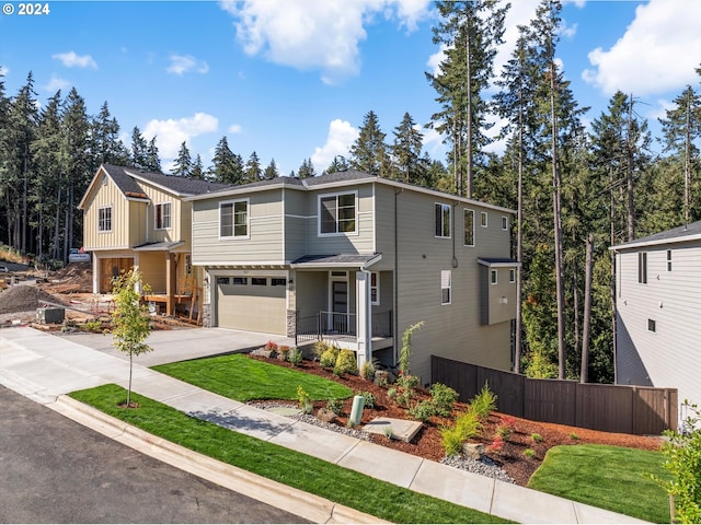 view of front of property with a garage