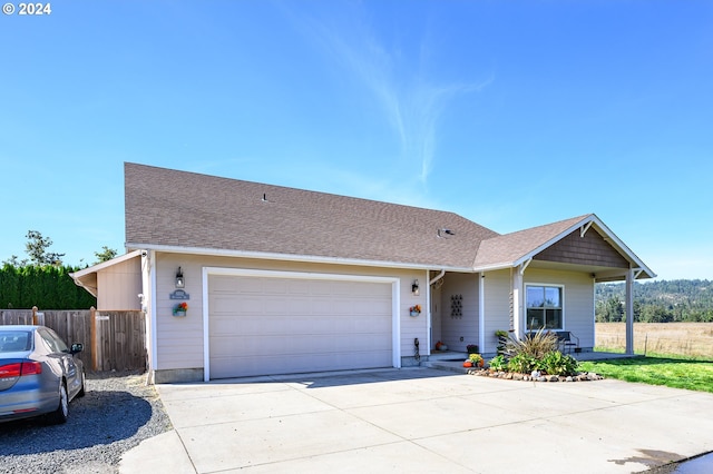 single story home with a garage