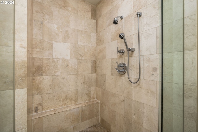 interior space featuring a tile shower