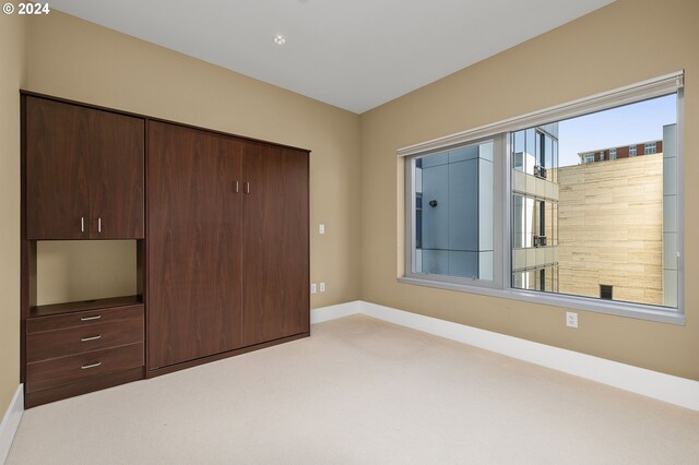 unfurnished bedroom featuring a closet