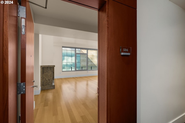 hallway featuring light wood-type flooring