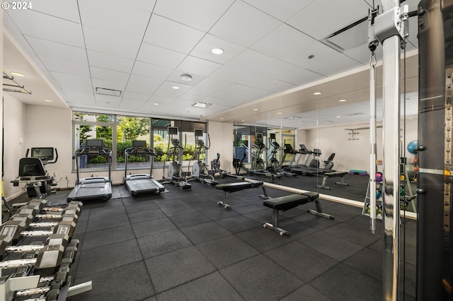 gym with floor to ceiling windows