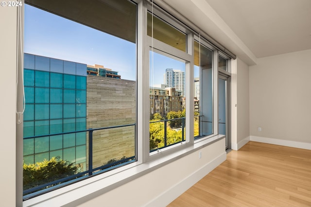 unfurnished room featuring light hardwood / wood-style floors