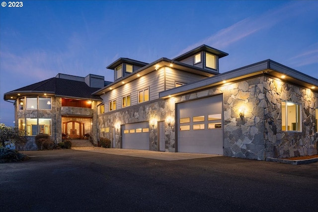 contemporary house featuring a garage