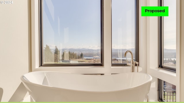 bathroom with a tub