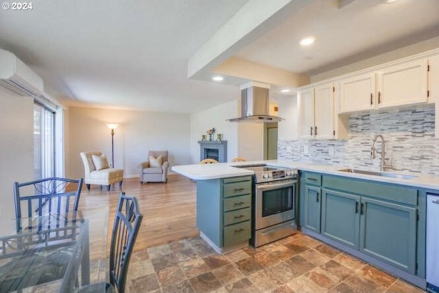 kitchen featuring backsplash, sink, range hood, white cabinetry, and stainless steel appliances