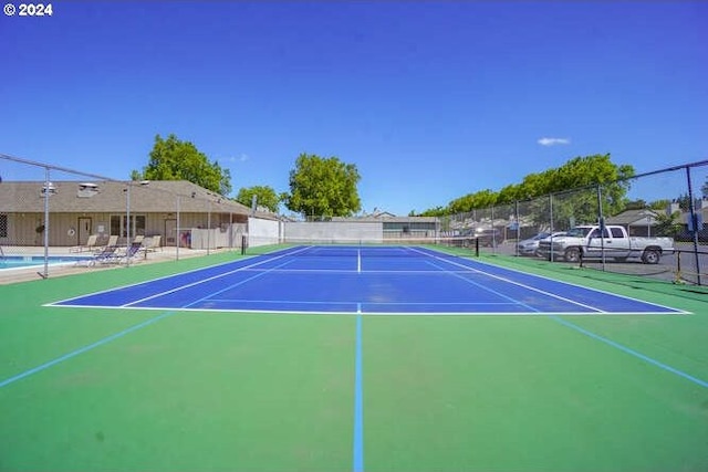 view of sport court featuring basketball court