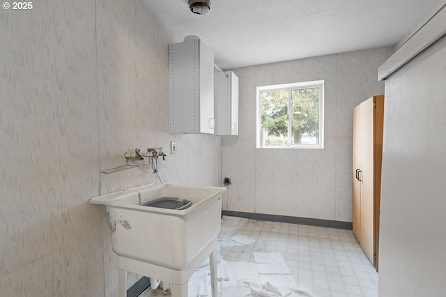 washroom with cabinets