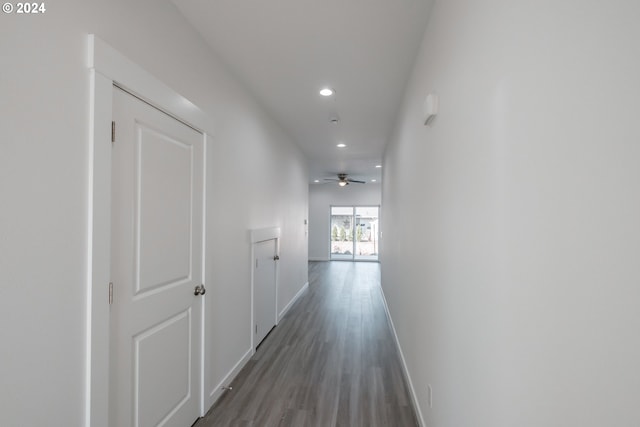 hallway featuring dark hardwood / wood-style flooring