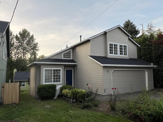 4135 SW Brugger St, Portland, OR 97219 - view of front of home with a garage and a front lawn
