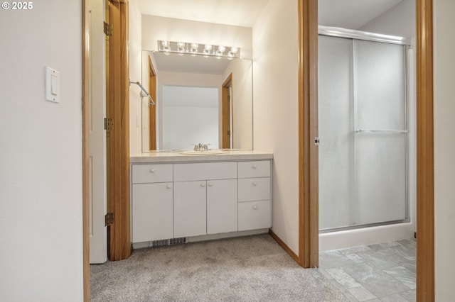 4135 SW Brugger St, Portland, OR 97219 - full bath featuring a stall shower, vanity, and carpet