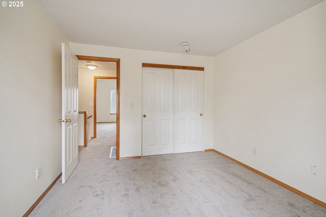 4135 SW Brugger St, Portland, OR 97219 - unfurnished bedroom with light carpet and a closet
