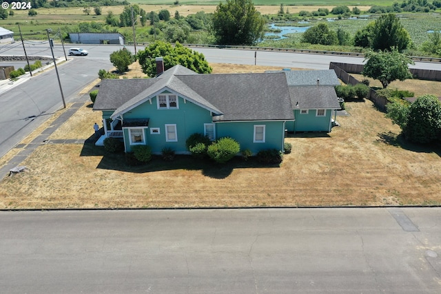 birds eye view of property featuring a rural view