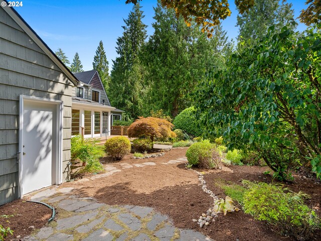 view of yard featuring a garage