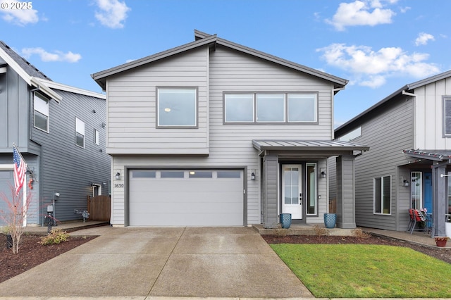 view of front of home featuring a garage and a front lawn