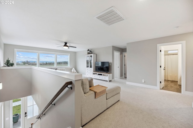 living room featuring light colored carpet