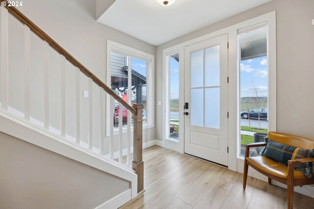 foyer entrance featuring light wood-type flooring