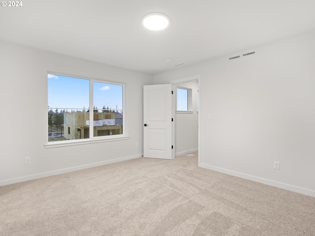 view of carpeted spare room