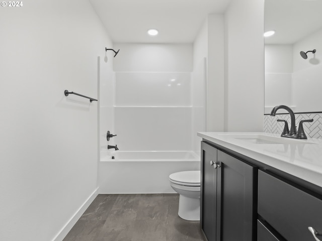 full bathroom featuring vanity, shower / bathtub combination, toilet, and wood-type flooring