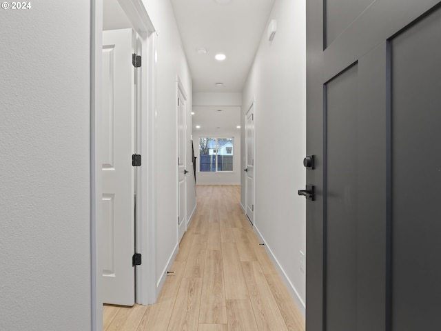 hallway featuring light hardwood / wood-style flooring